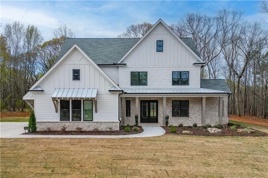 Front exterior of a new home in , Pendergrass, GA, highlighting curb appeal (Image 24).
