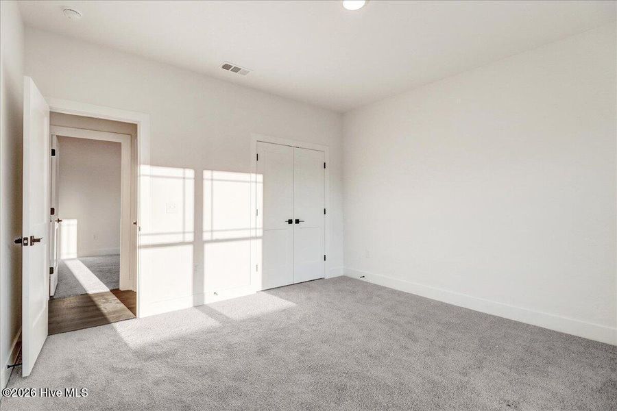 Spacious, unfurnished interior of a new home in Wood Creek, Leland (Image 24).