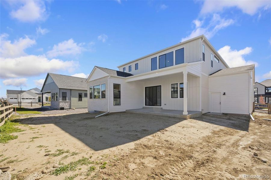 Exterior details and patio area of a home in Kitchel Lake at Serratoga Falls, Timnath (Image 2).