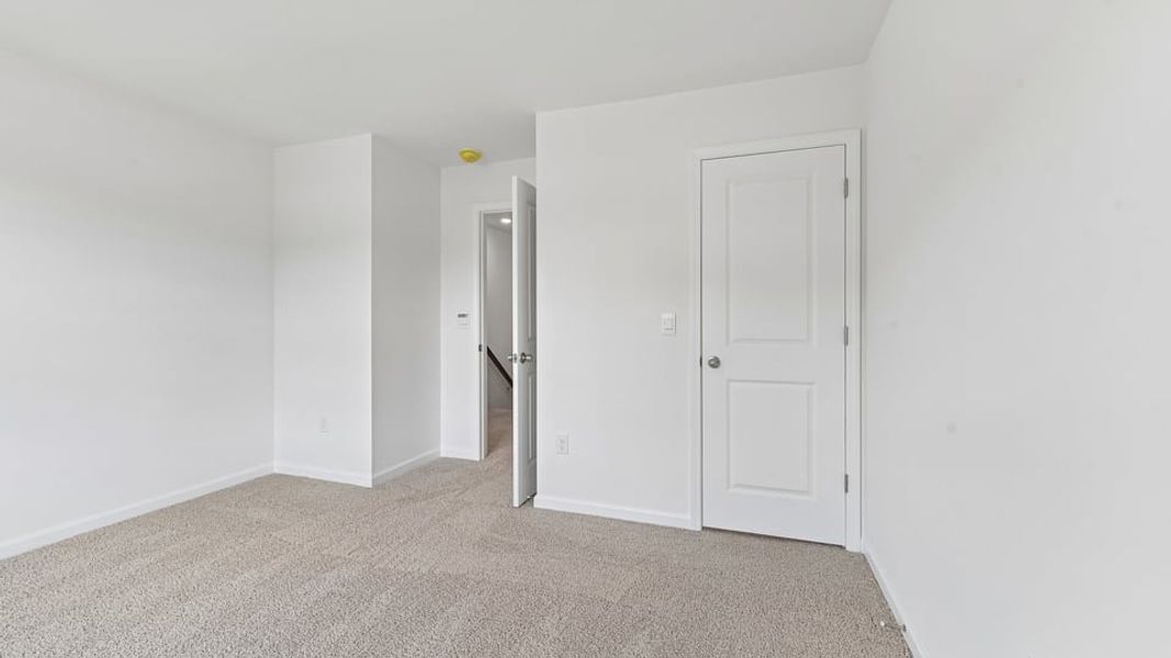 Representative unfurnished interior of a home built from the Calhoun by D.R. Horton in Collins Ridge, Hillsborough (Image 26).