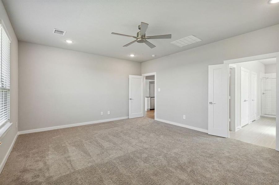 Primary Suite in the Henley home plan by Trophy Signature Homes – REPRESENTATIVE PHOTO Primary Suite in the Henley home plan by Trophy Signature Homes – REPRESENTATIVE PHOTO