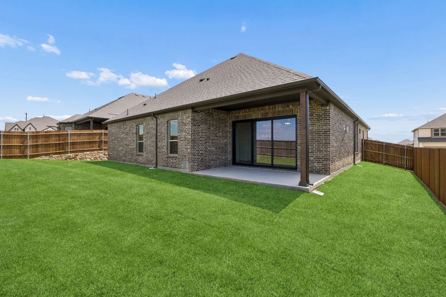Exterior details and patio area of a home in Country Lakes, Denton (Image 3). Exterior details and patio area of a home in Country Lakes, Denton (Image 3).