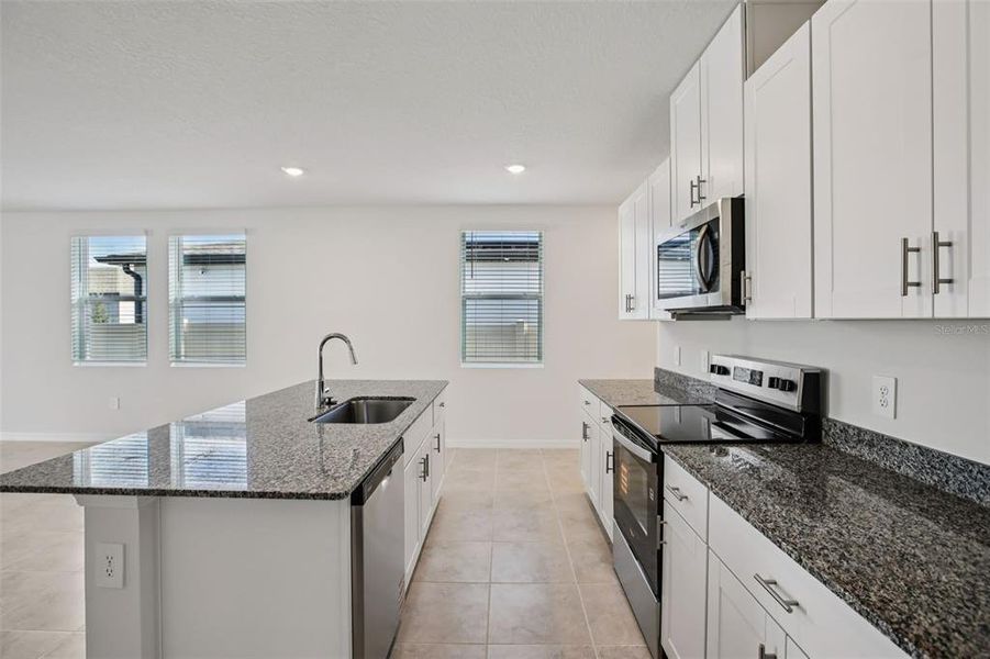 Furnished interior view inside a new home in Villamar - Classic Series, Winter Haven (Image 9).