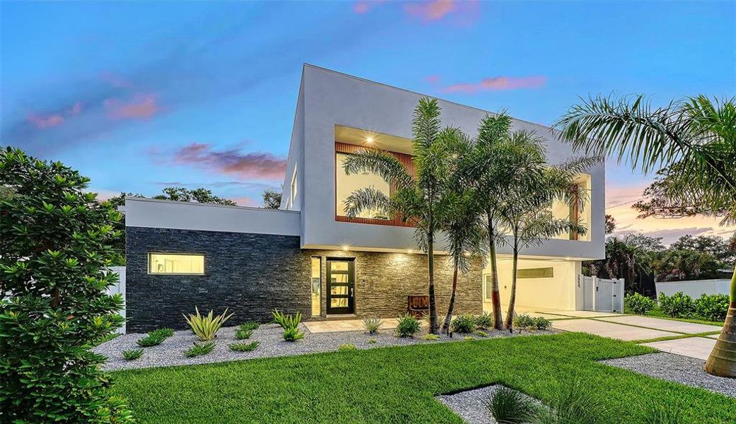 Front exterior of a new home in , Sarasota, FL, highlighting curb appeal (Image 23).