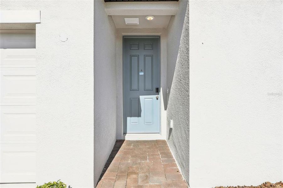 Exterior details and patio area of a home in Bradbury Creek - Signature Series, Haines City (Image 4).