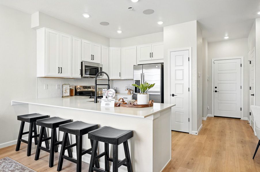 Representative furnished interior of a home built from the Discovery by Taylor Morrison in Parterre Townhomes - The Westerly Collection, Thornton (Image 5).