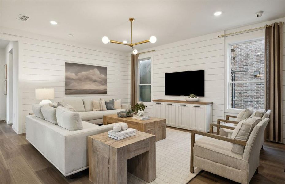 Expansive gathering room bathed in natural sunlight *Model representation