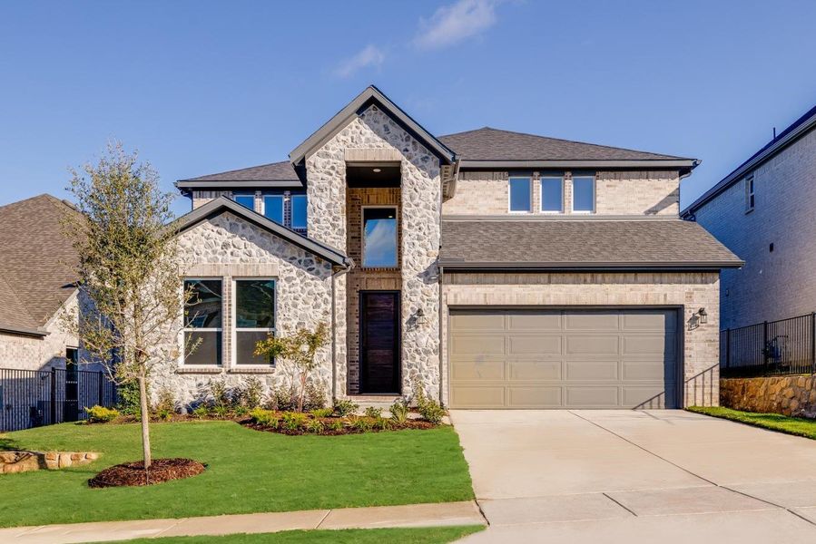 Representative exterior photo of a completed home built from the Carmine by Taylor Morrison in Highland Lakes 50s, McKinney, TX (Image 2). Representative exterior photo of a completed home built from the Carmine by Taylor Morrison in Highland Lakes 50s, McKinney, TX (Image 2).
