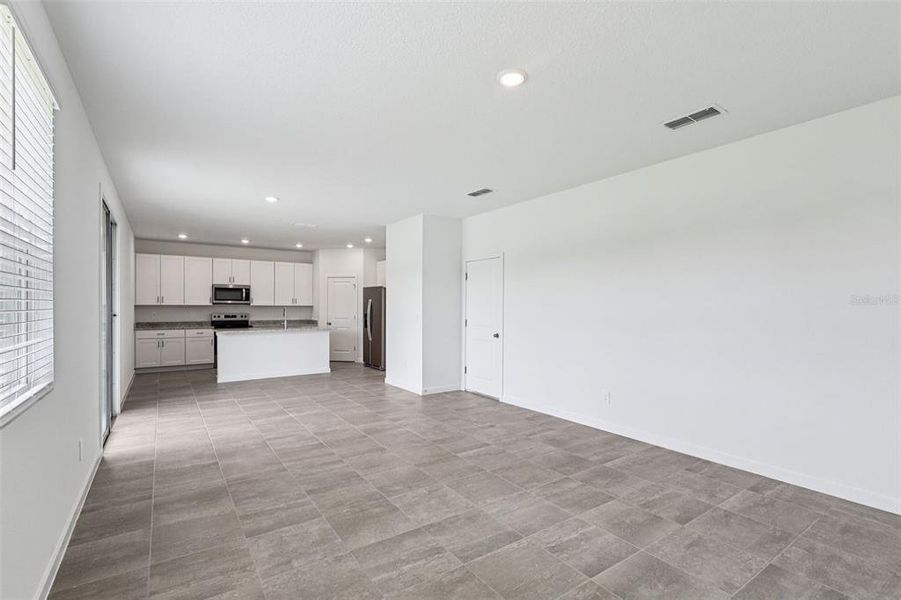 Spacious, unfurnished interior of a new home in Flagler Village - Signature Series, Palm Coast (Image 19). Spacious, unfurnished interior of a new home in Flagler Village - Signature Series, Palm Coast (Image 19).