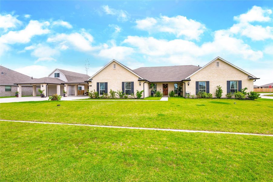 Front exterior of a new home in , Dickinson, TX, highlighting curb appeal (Image 2). Front exterior of a new home in , Dickinson, TX, highlighting curb appeal (Image 2).