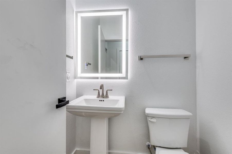 Bathroom featuring toilet Bathroom featuring toilet