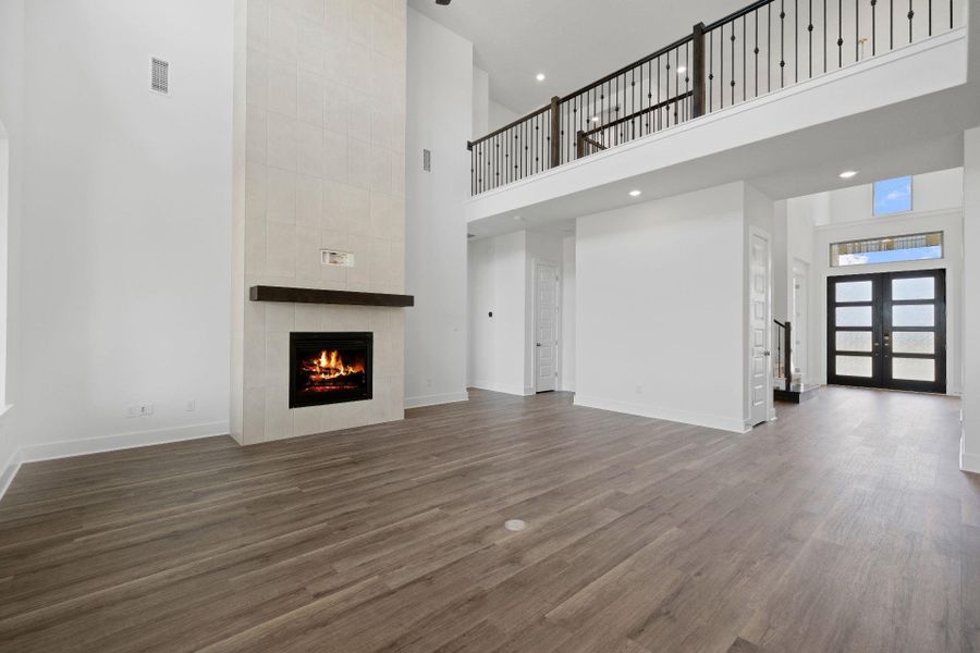 Family Room with soaring ceiling & fireplace Family Room with soaring ceiling & fireplace