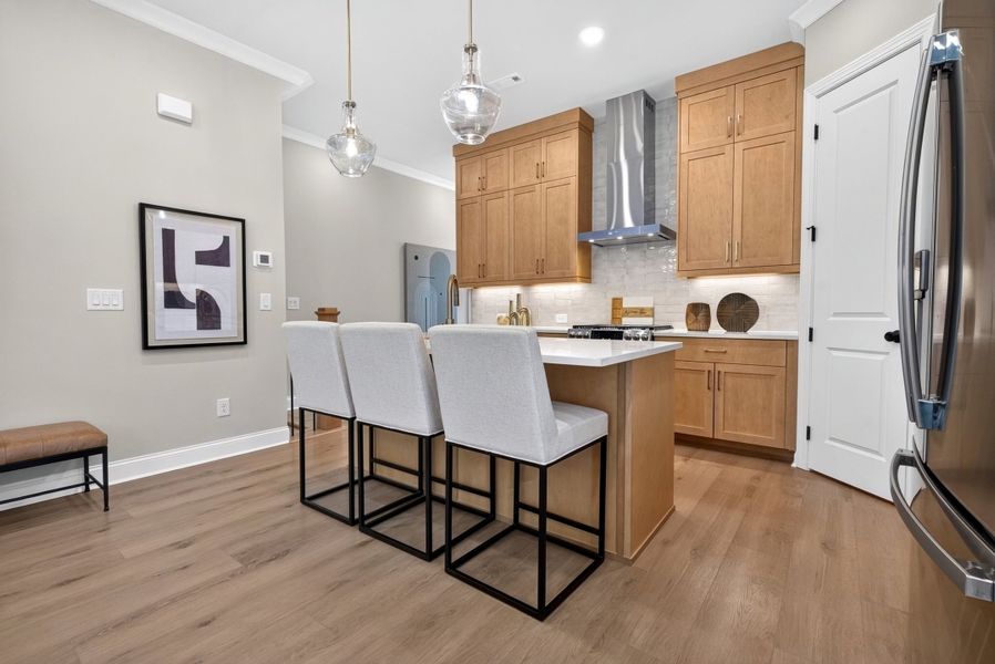 Representative furnished interior of a home built from the The Benton IV by The Providence Group in Ward's Crossing Townhomes, Johns Creek (Image 19).