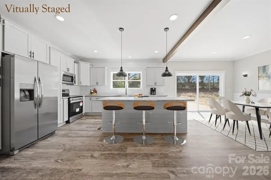 Furnished interior view inside a new home in , Lenoir (Image 9).