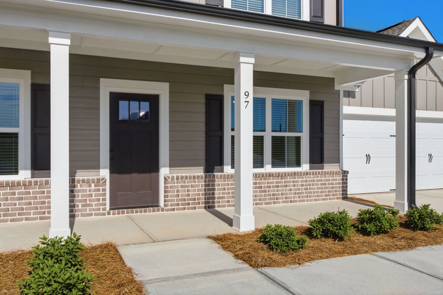Exterior details and patio area of a home in Cherokee Knoll, Williamston (Image 3).