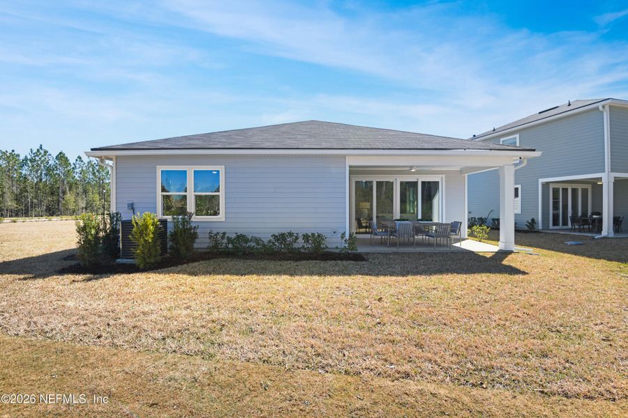 Exterior details and patio area of a home in Aspen Trail, Jacksonville (Image 4).