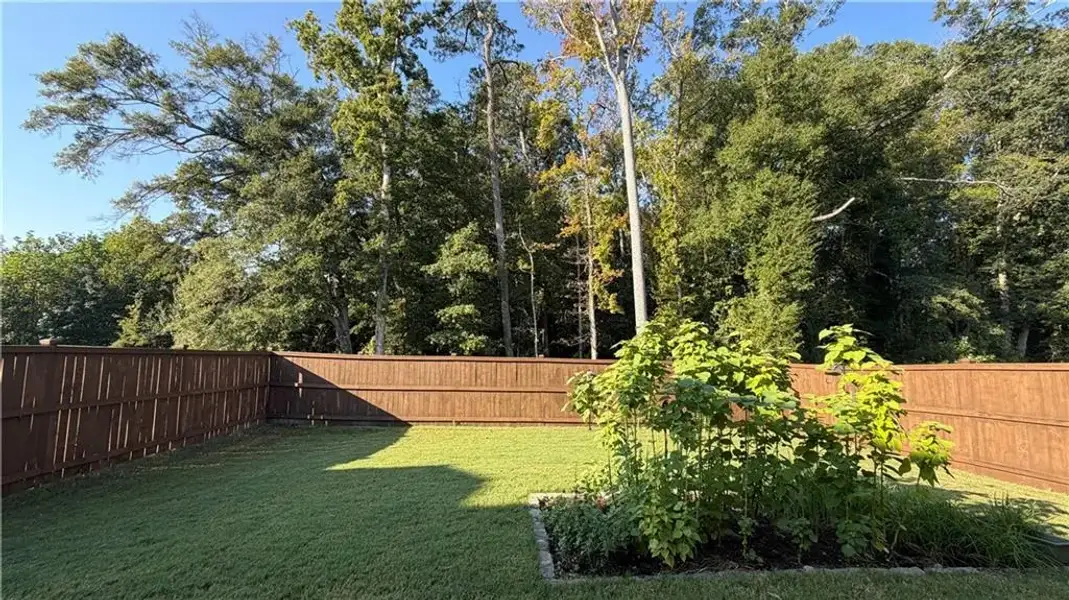 Exterior details and patio area of a home in Graystone Village, Grayson (Image 24).