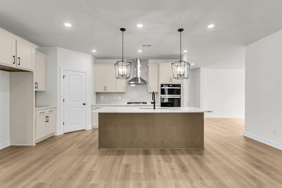 Furnished interior view inside a new home in Tidewater at Lakes of Cane Bay, Summerville (Image 8).