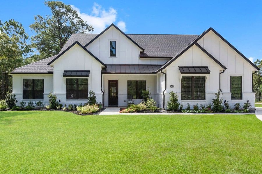 Representative exterior photo of a completed home built from the 3369 by Gracepoint Homes in Chapel Bend, Montgomery, TX (Image 8). Representative exterior photo of a completed home built from the 3369 by Gracepoint Homes in Chapel Bend, Montgomery, TX (Image 8).