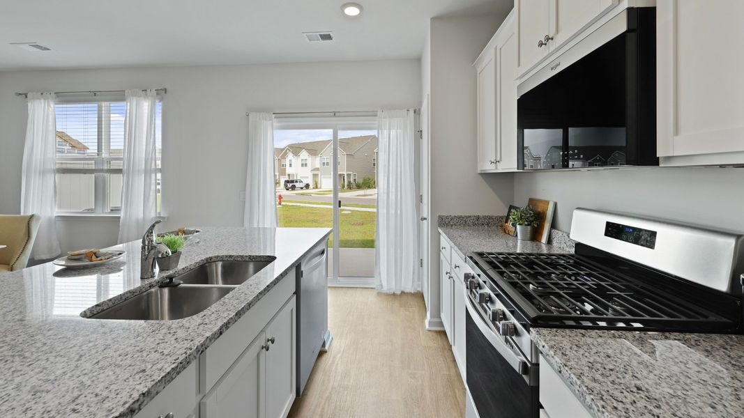 Representative furnished interior of a home built from the DUNCAN by D.R. Horton in Carolina Groves Townhomes, Moncks Corner (Image 7).