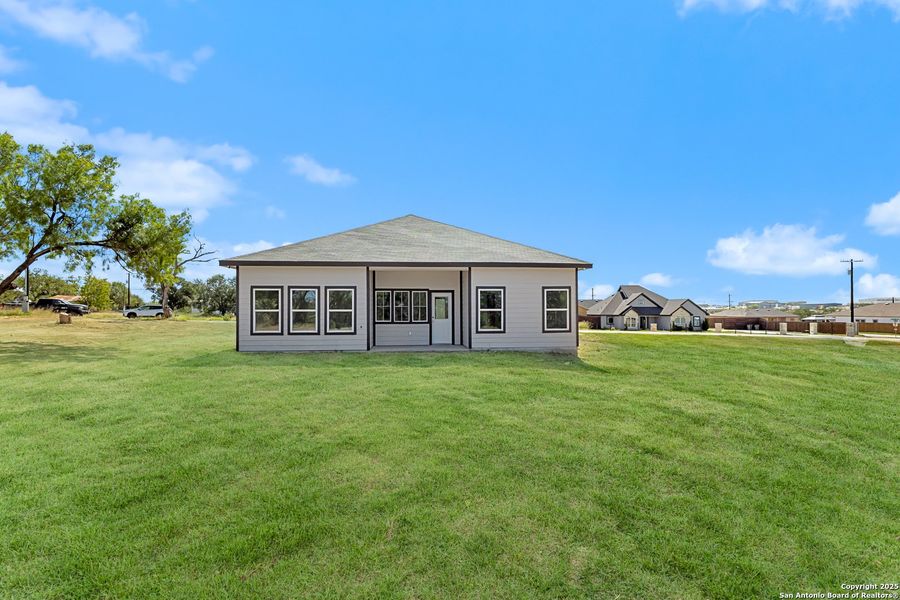 Front exterior of a new home in , San Antonio, TX, highlighting curb appeal (Image 2). Front exterior of a new home in , San Antonio, TX, highlighting curb appeal (Image 2).