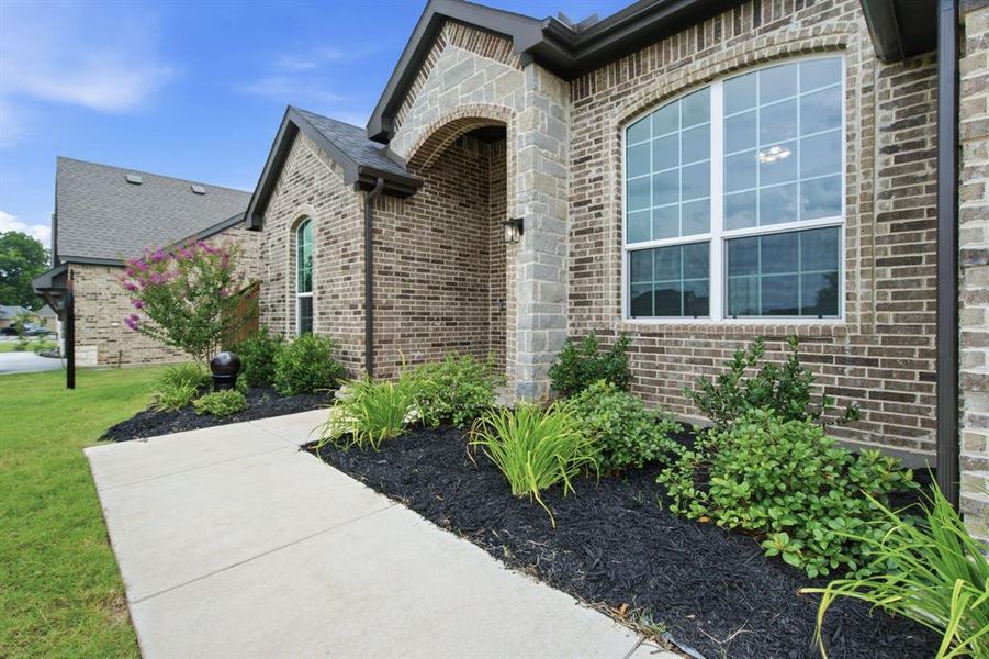 Exterior details and patio area of a home in Covenant Springs, Springtown (Image 22).