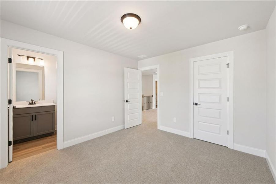 Spacious, unfurnished interior of a new home in Vines at Mill Creek - Estate Series, Braselton (Image 24).