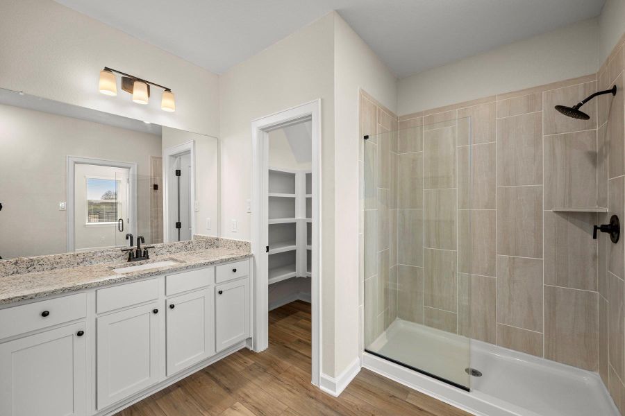 Furnished interior view inside a new home in Sunterra, Katy (Image 4).