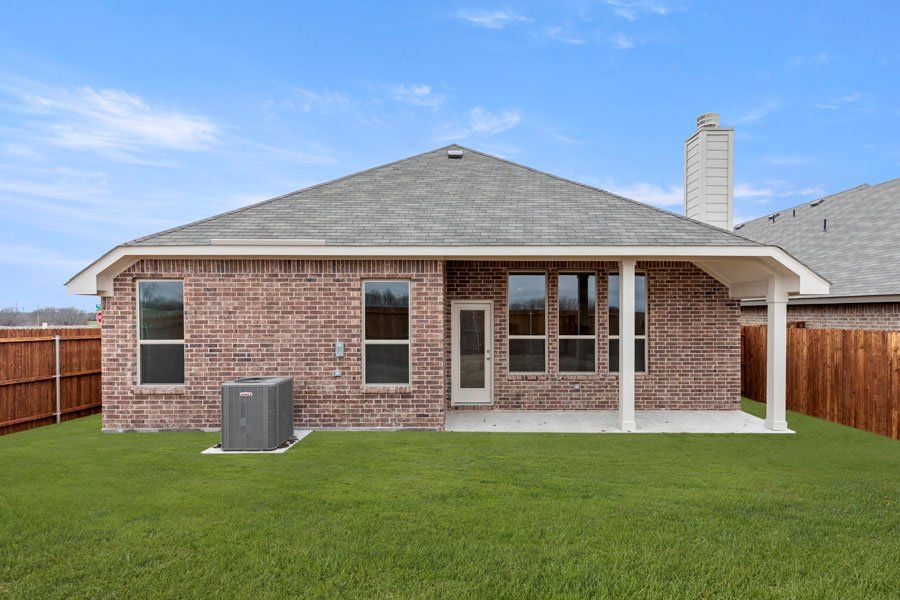 Representative exterior photo of a completed home built from the Kingston by Impression Homes in Timberbrook, Justin, TX (Image 28).