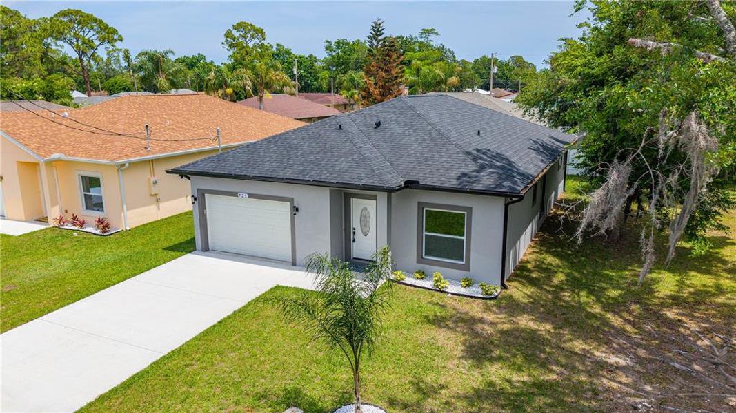 Front exterior of a new home in , Daytona Beach, FL, highlighting curb appeal (Image 30). Front exterior of a new home in , Daytona Beach, FL, highlighting curb appeal (Image 30).