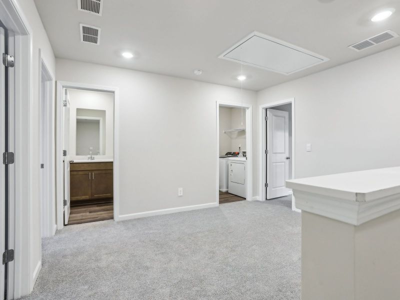 Spacious, unfurnished interior of a new home in Brooks Lake, Loganville (Image 15).