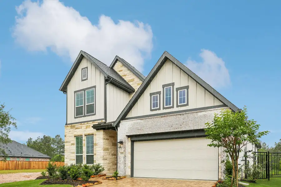Front exterior of a new home in , Montgomery, TX, highlighting curb appeal (Image 1). Front exterior of a new home in , Montgomery, TX, highlighting curb appeal (Image 1).
