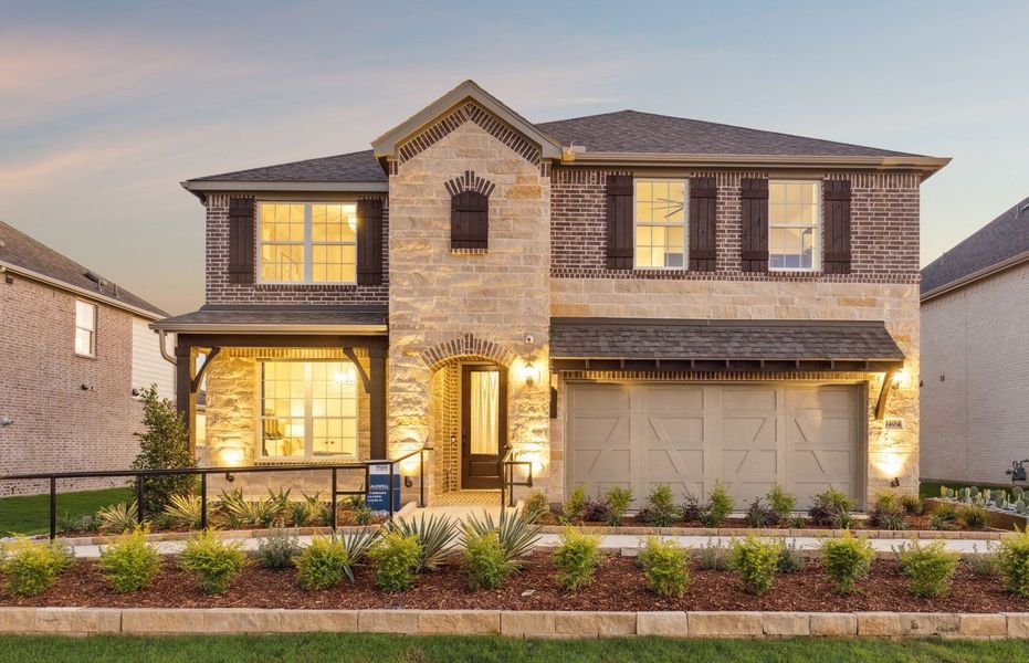 The Caldwell, a two-story home with covered front porch and 2-car garage