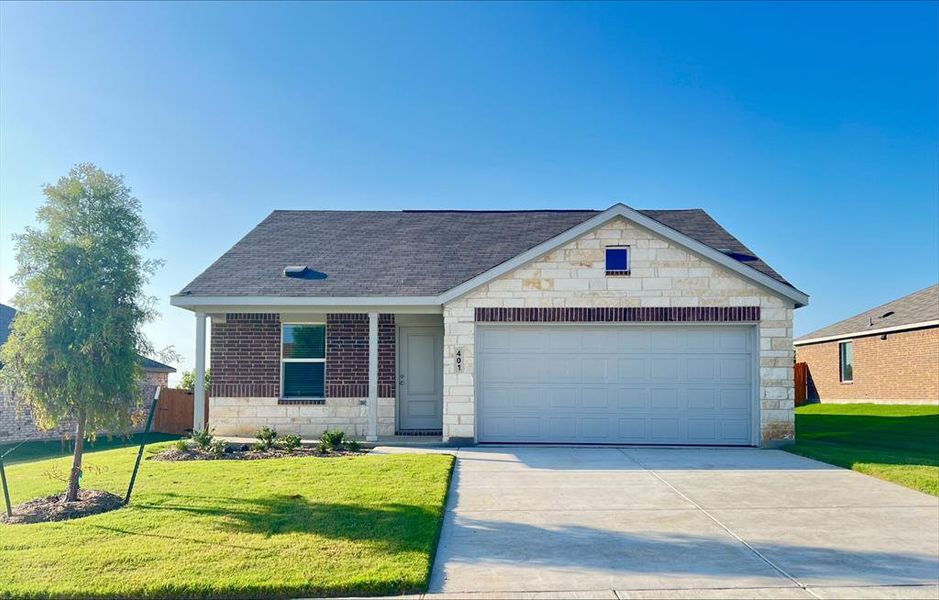 Front exterior of a new home in Travis Heights, Sherman, TX, highlighting curb appeal (Image 1). Front exterior of a new home in Travis Heights, Sherman, TX, highlighting curb appeal (Image 1).