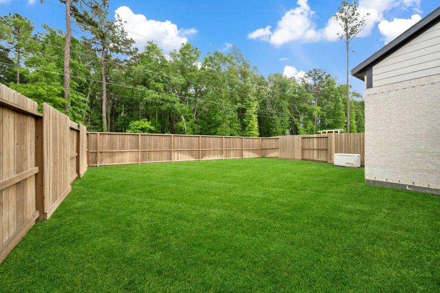 Exterior details and patio area of a home in The Highlands, Porter (Image 3).