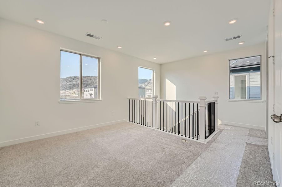 Spacious, unfurnished interior of a new home in Red Rocks Ranch: The Skyline Collection, Morrison (Image 6). Spacious, unfurnished interior of a new home in Red Rocks Ranch: The Skyline Collection, Morrison (Image 6).
