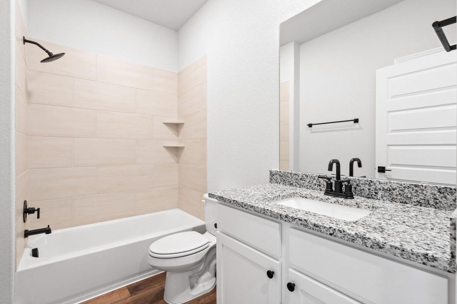 Furnished interior view inside a new home in Whisper Valley, Manor (Image 6).