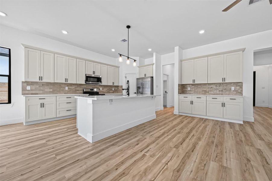 Furnished interior view inside a new home in , Conroe (Image 8).
