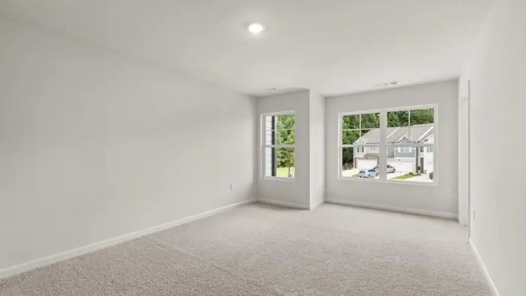 Spacious, unfurnished interior of a new home in Waypoint, Flowery Branch (Image 17).