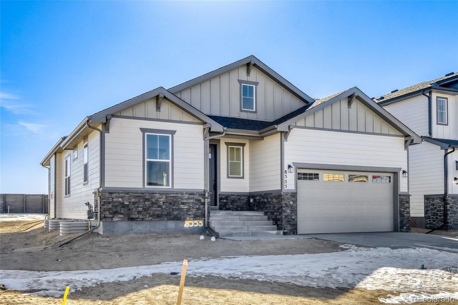 Front exterior of a new home in Sterling Ridge in Sterling, Colorado Springs, CO, highlighting curb appeal (Image 2). Front exterior of a new home in Sterling Ridge in Sterling, Colorado Springs, CO, highlighting curb appeal (Image 2).