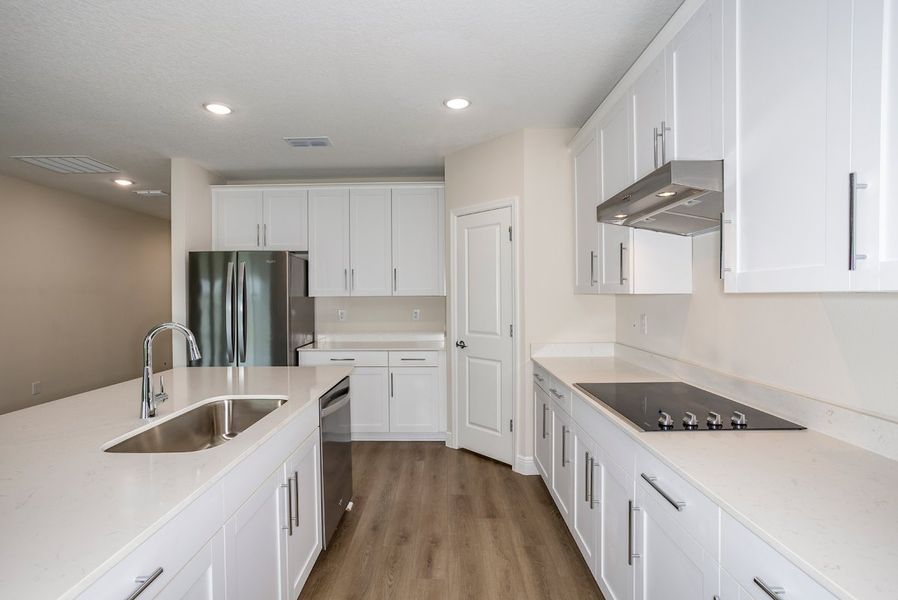 Furnished interior view inside a new home in Pasadena Landing, Wesley Chapel (Image 6).