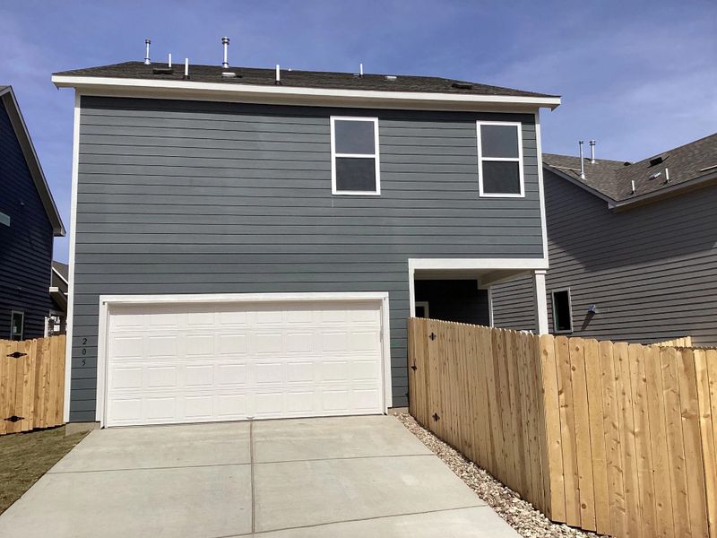 Exterior details and patio area of a home in Lariat, Liberty Hill (Image 4).