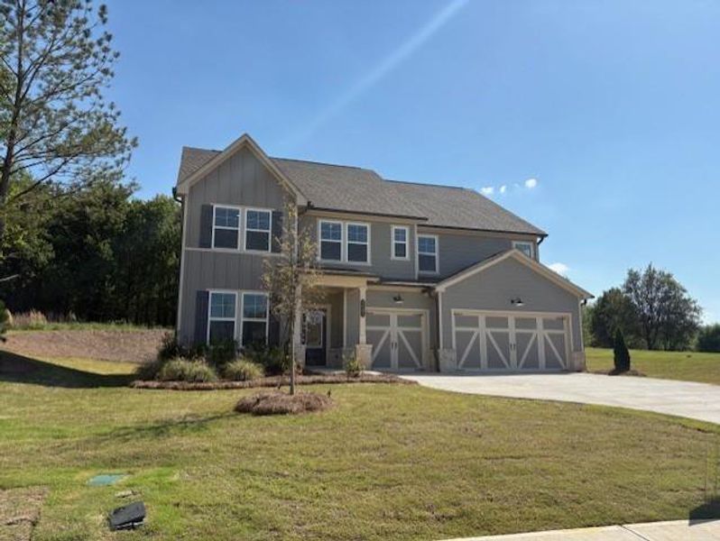Front exterior of a new home in Wellington Estates, Madison, GA, highlighting curb appeal (Image 2).