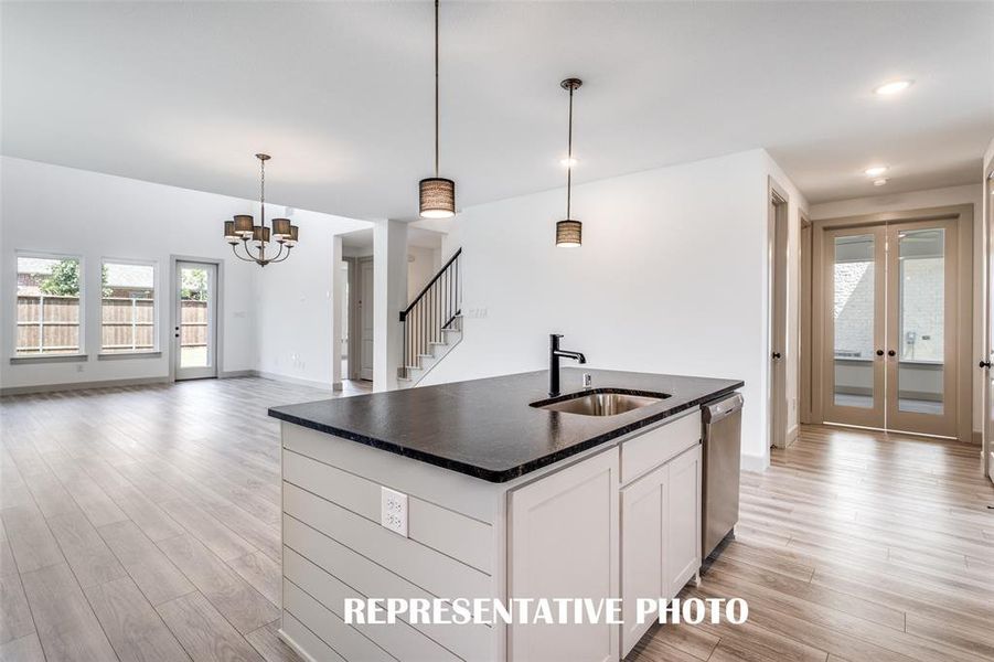 The large kitchen island is the perfect place for a quick family meal or after school homework station.  REPRESENTATIVE PHOTO.