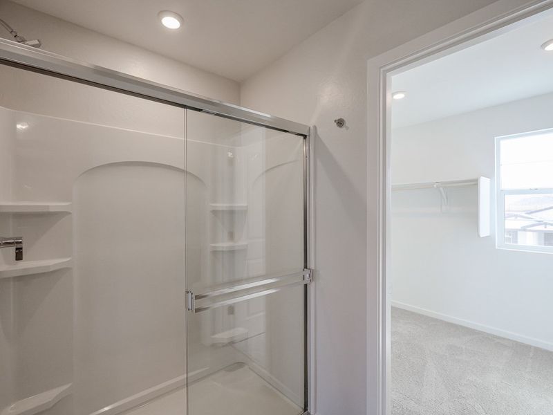 A shower unit in a bathroom.