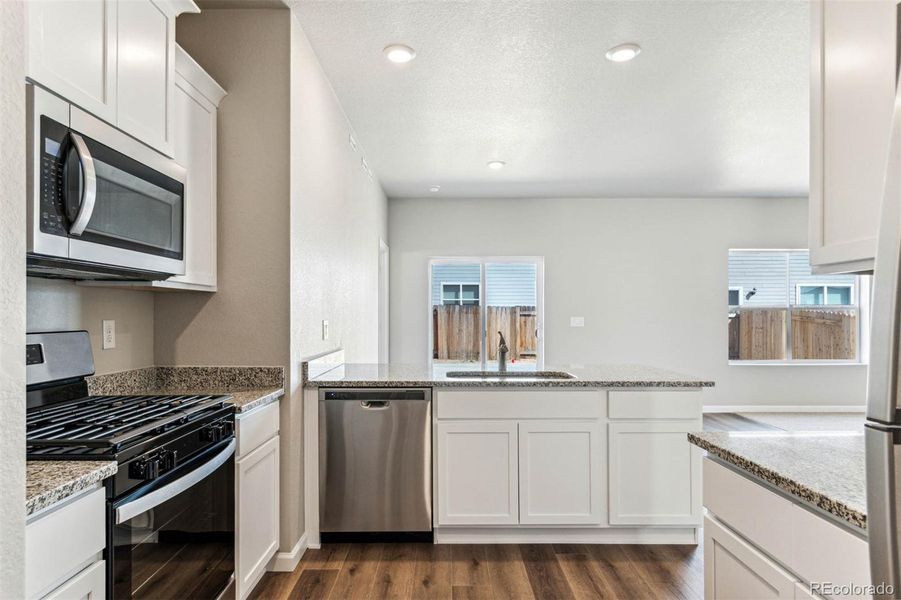 Furnished interior view inside a new home in Second Creek Farm, Commerce City (Image 8).