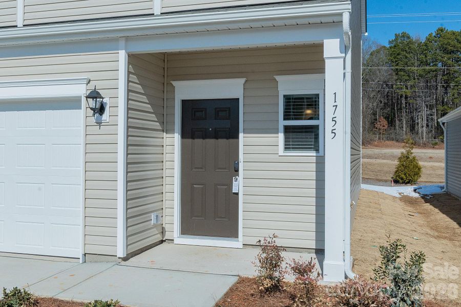 Exterior details and patio area of a home in Country Club Village, Salisbury (Image 22).