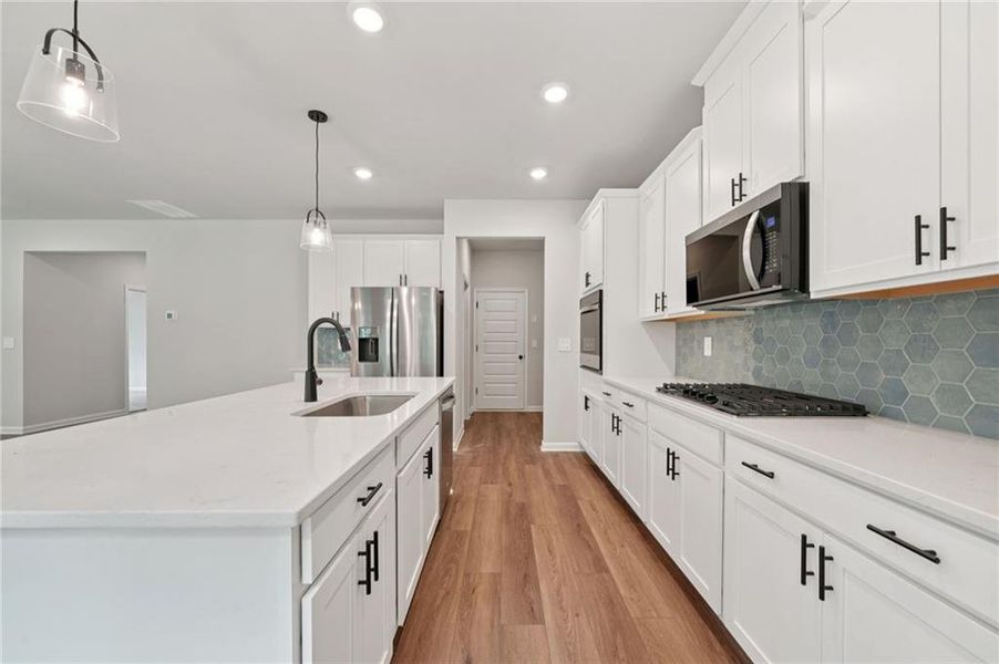 Furnished interior view inside a new home in Vines at Mill Creek - Estate Series, Braselton (Image 27).