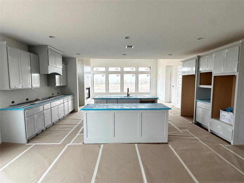 Kitchen featuring a center island and gray cabinetry