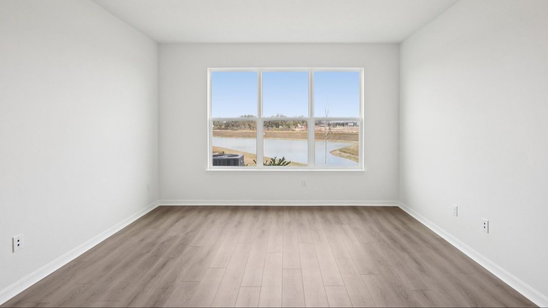 Furnished interior view inside a new home in Isla Mirada, San Antonio (Image 13).